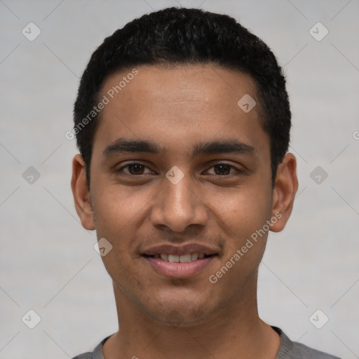 Joyful latino young-adult male with short  black hair and brown eyes