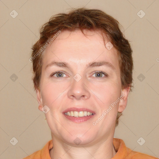 Joyful white adult female with medium  brown hair and brown eyes