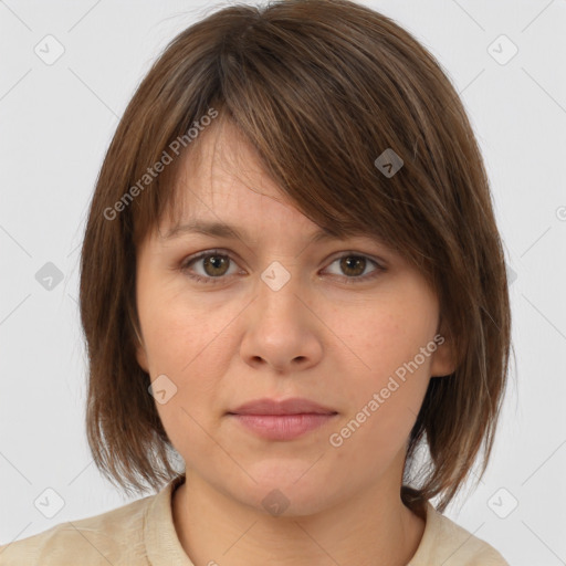 Neutral white young-adult female with medium  brown hair and brown eyes