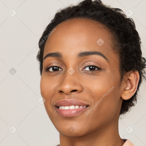 Joyful latino young-adult female with short  brown hair and brown eyes