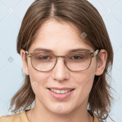 Joyful white young-adult female with medium  brown hair and blue eyes