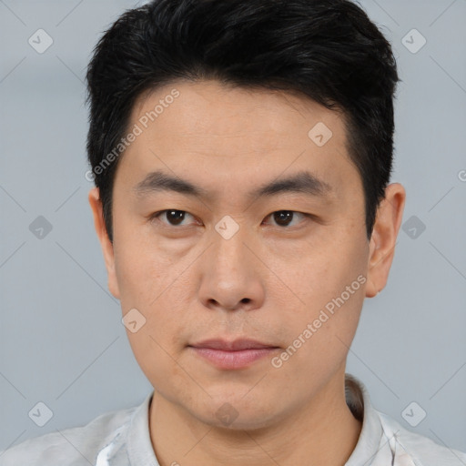 Neutral asian young-adult male with short  brown hair and brown eyes