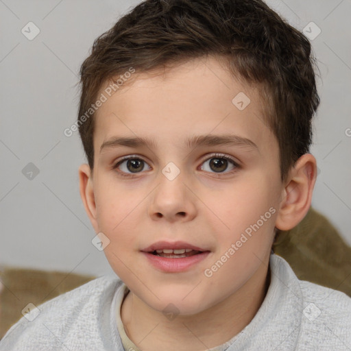 Joyful white child male with short  brown hair and brown eyes