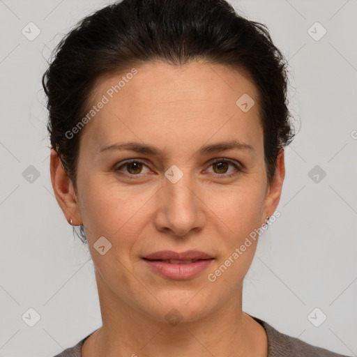 Joyful white adult female with short  brown hair and brown eyes