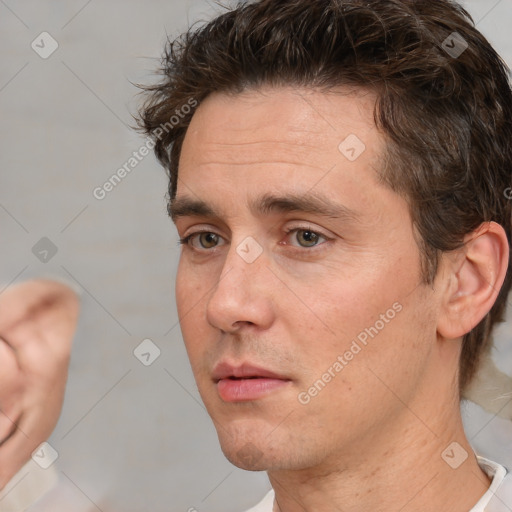 Neutral white adult male with short  brown hair and brown eyes