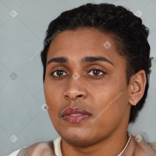 Neutral black young-adult female with short  black hair and brown eyes