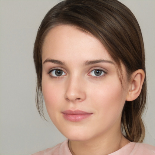 Neutral white young-adult female with medium  brown hair and brown eyes