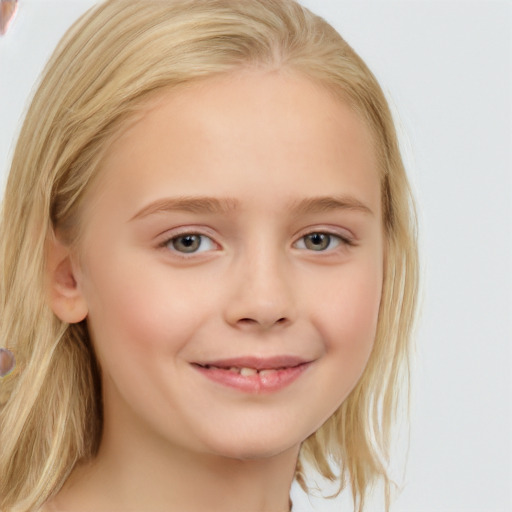 Joyful white child female with medium  blond hair and blue eyes