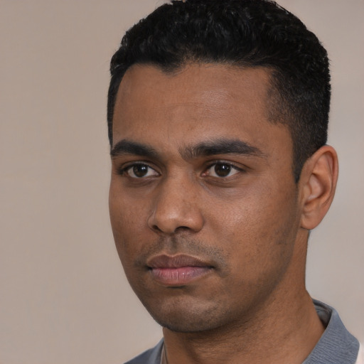 Neutral black young-adult male with short  black hair and brown eyes