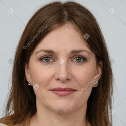 Joyful white adult female with medium  brown hair and brown eyes