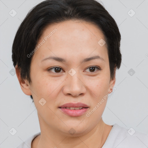 Joyful asian young-adult female with short  brown hair and brown eyes