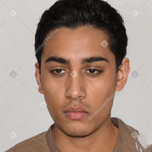 Neutral latino young-adult male with short  black hair and brown eyes