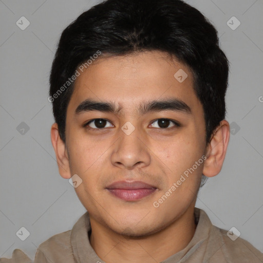 Joyful latino young-adult male with short  brown hair and brown eyes