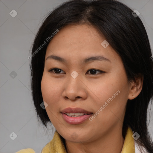 Joyful asian young-adult female with medium  brown hair and brown eyes