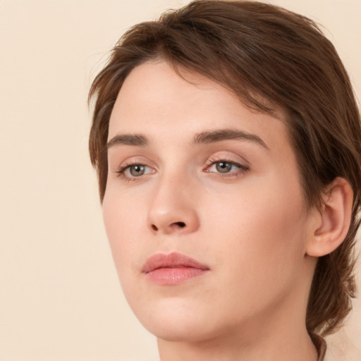 Neutral white young-adult female with medium  brown hair and brown eyes