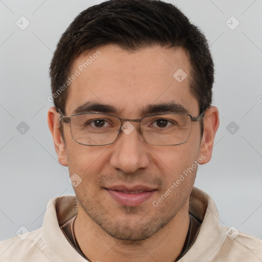 Joyful white adult male with short  brown hair and brown eyes