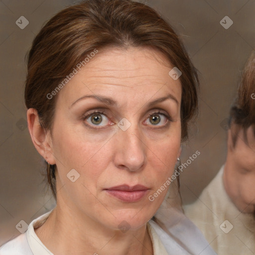 Neutral white adult female with medium  brown hair and brown eyes