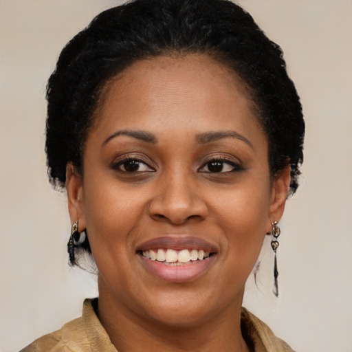 Joyful black young-adult female with medium  brown hair and brown eyes