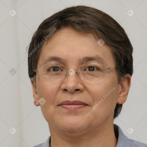 Joyful white adult female with short  brown hair and brown eyes