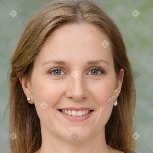 Joyful white adult female with medium  brown hair and grey eyes