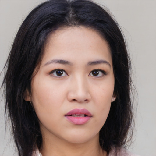 Neutral asian young-adult female with medium  black hair and brown eyes