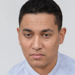 Neutral white young-adult male with short  black hair and brown eyes
