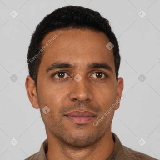 Neutral latino young-adult male with short  black hair and brown eyes