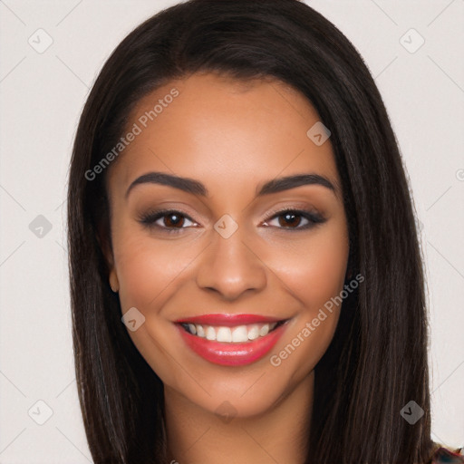 Joyful latino young-adult female with long  black hair and brown eyes