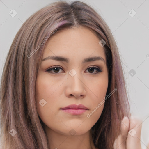 Neutral white young-adult female with long  brown hair and brown eyes