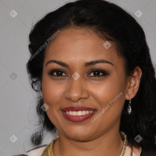 Joyful black young-adult female with long  brown hair and brown eyes