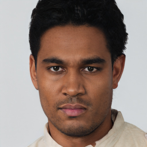 Neutral black young-adult male with short  black hair and brown eyes
