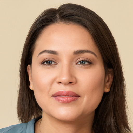 Joyful white young-adult female with long  brown hair and brown eyes