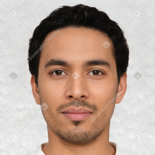 Neutral latino young-adult male with short  black hair and brown eyes