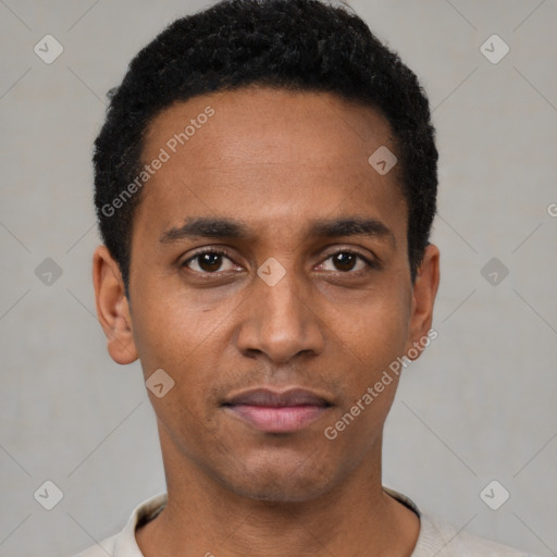 Neutral black young-adult male with short  black hair and brown eyes