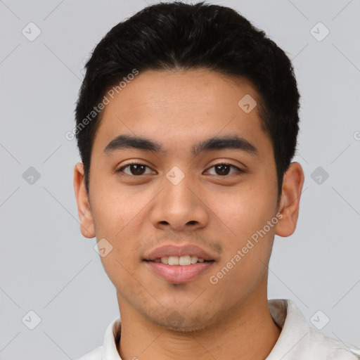 Joyful asian young-adult male with short  black hair and brown eyes