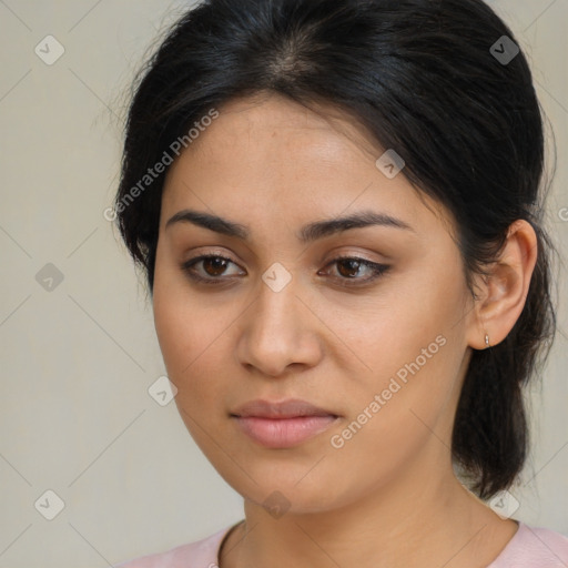 Joyful latino young-adult female with medium  brown hair and brown eyes