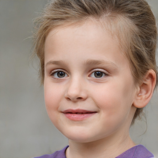 Joyful white child female with medium  brown hair and grey eyes