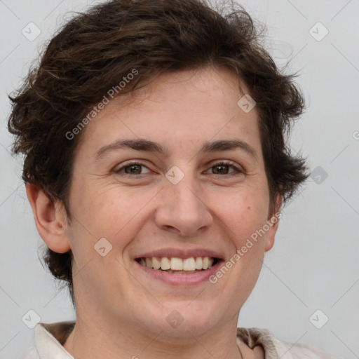 Joyful white adult female with short  brown hair and brown eyes