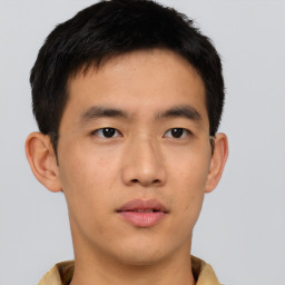 Neutral asian young-adult male with short  brown hair and brown eyes