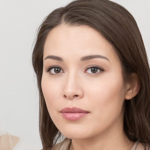 Neutral white young-adult female with long  brown hair and brown eyes