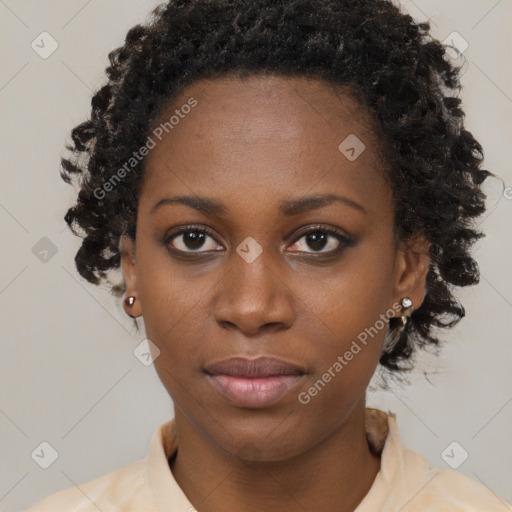 Neutral black young-adult female with short  brown hair and brown eyes