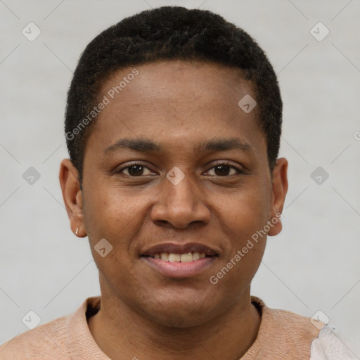 Joyful black young-adult male with short  brown hair and brown eyes