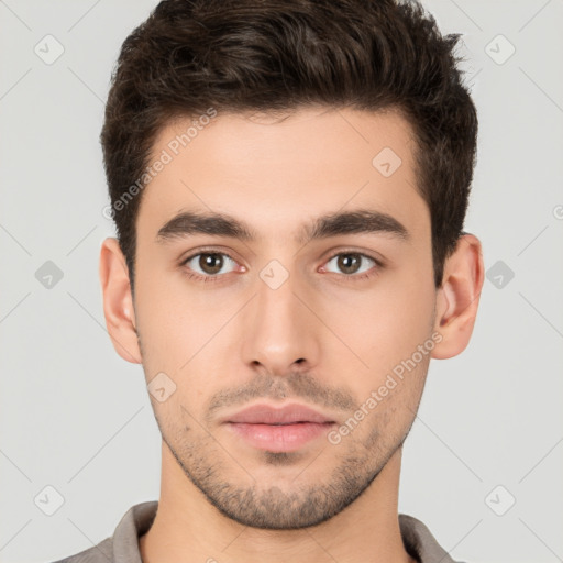 Neutral white young-adult male with short  brown hair and brown eyes