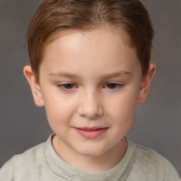 Joyful white child female with short  brown hair and brown eyes