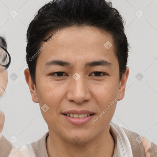 Joyful asian young-adult male with short  brown hair and brown eyes