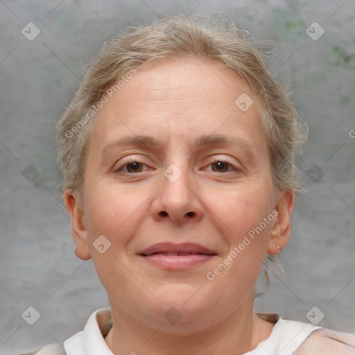 Joyful white adult female with short  brown hair and brown eyes