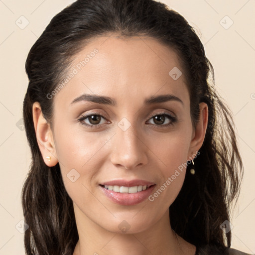 Joyful white young-adult female with long  brown hair and brown eyes