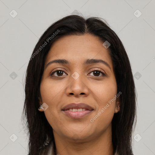 Joyful asian young-adult female with long  brown hair and brown eyes