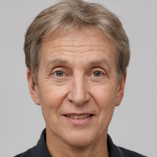 Joyful white middle-aged male with short  brown hair and brown eyes