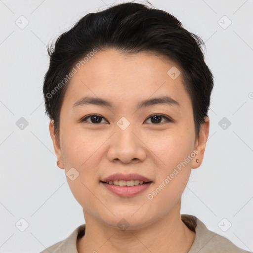 Joyful asian young-adult female with short  brown hair and brown eyes